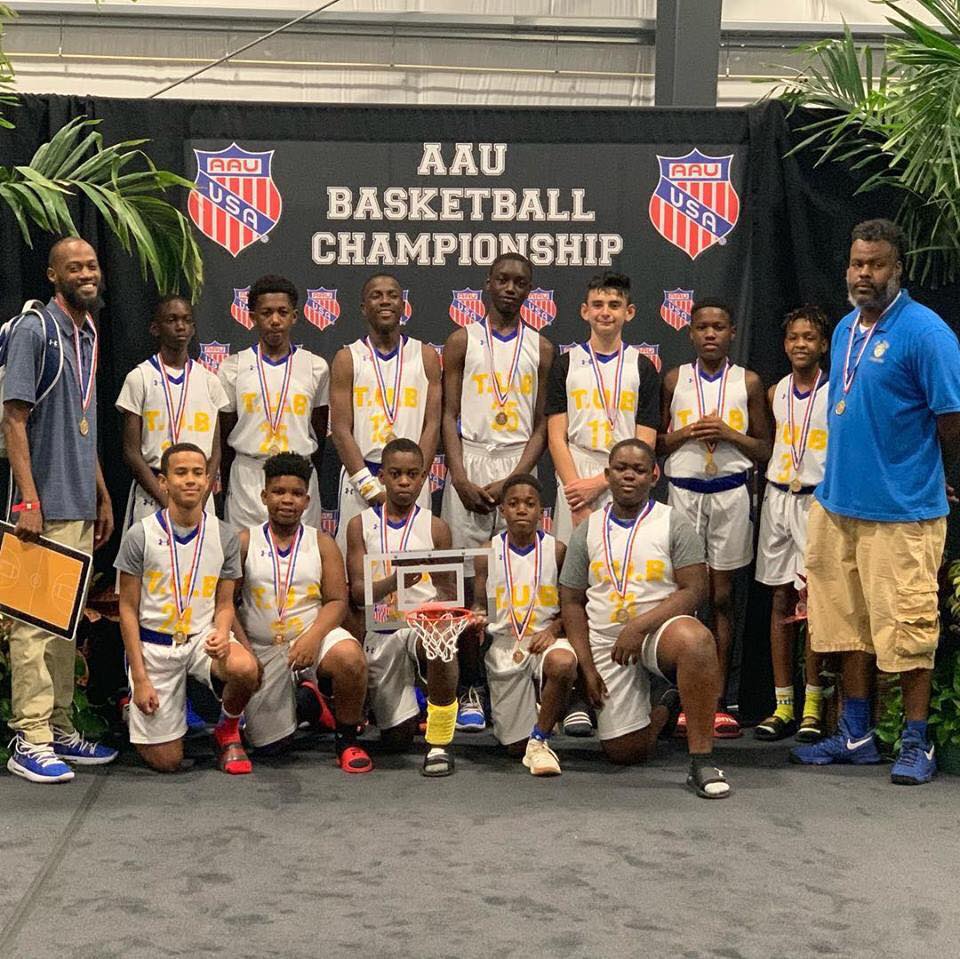 Titans basketball players at AAU Basketball Championship
