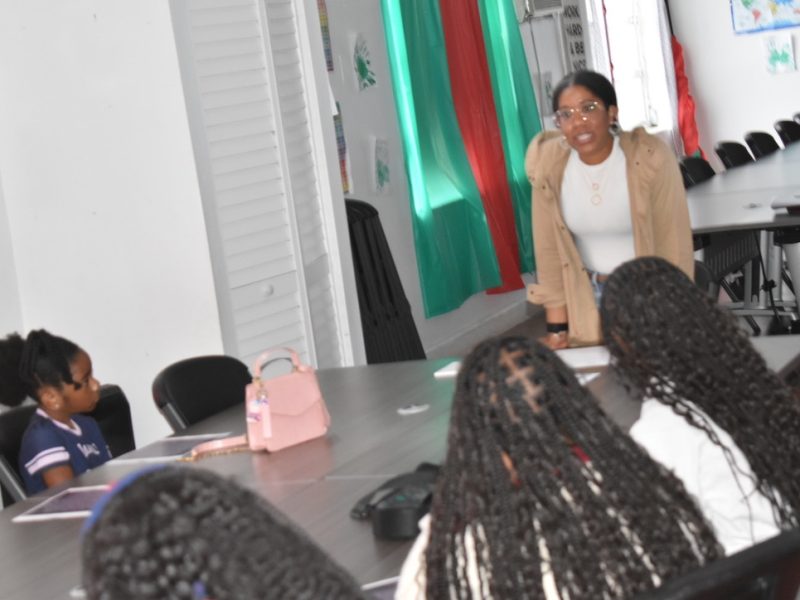 mentor speaking with girls
