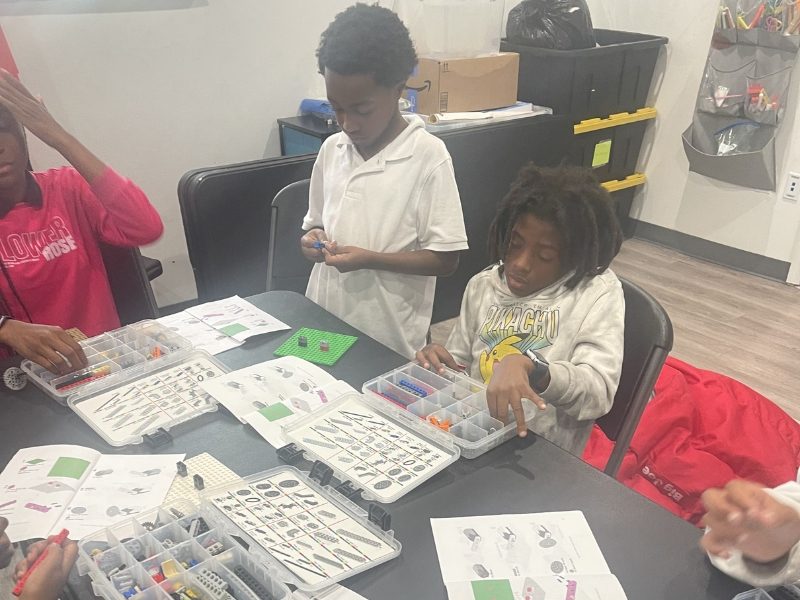 students building blocks with legos
